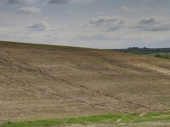 Water running down a field.